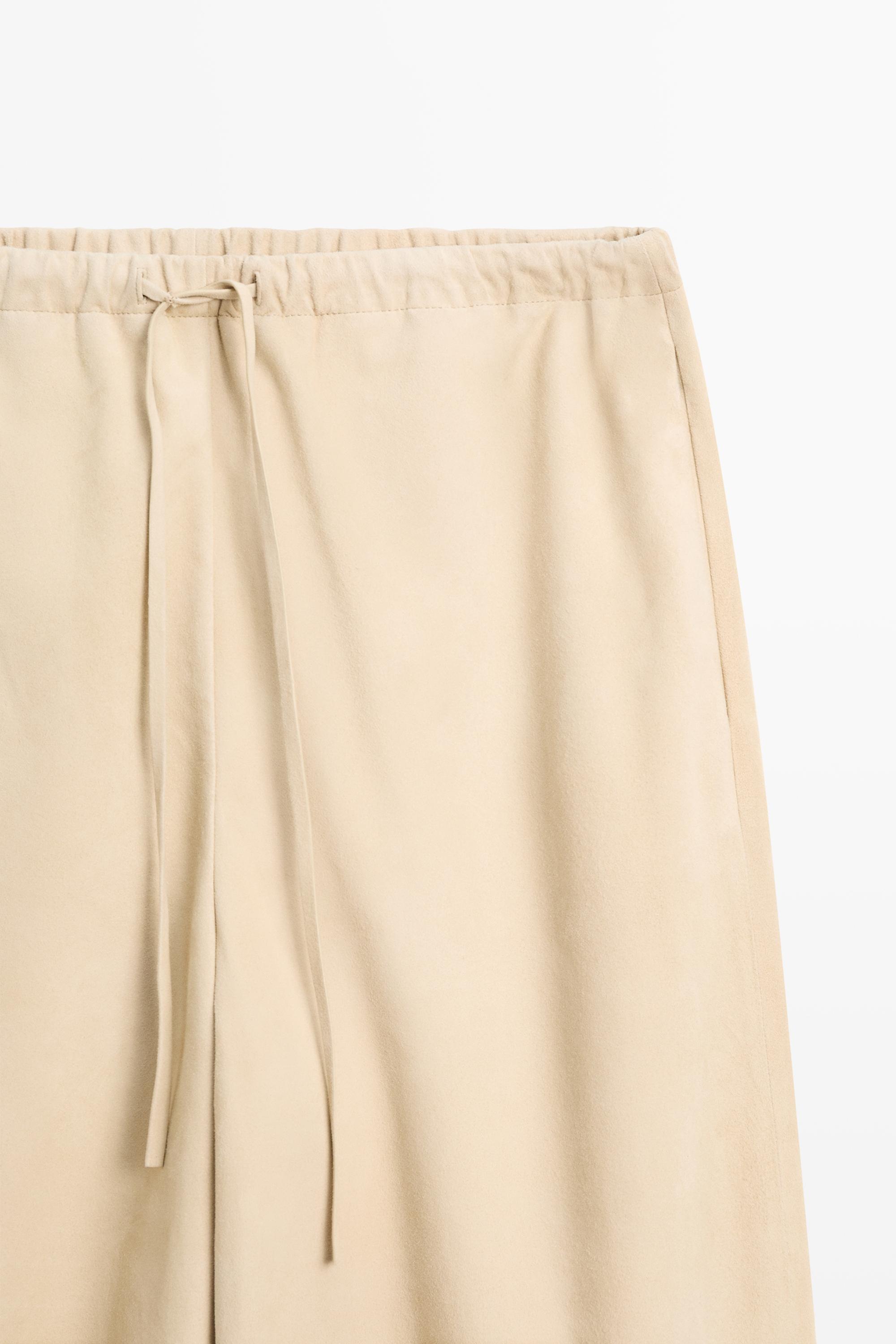 Pantalon bouffant en cuir et daim